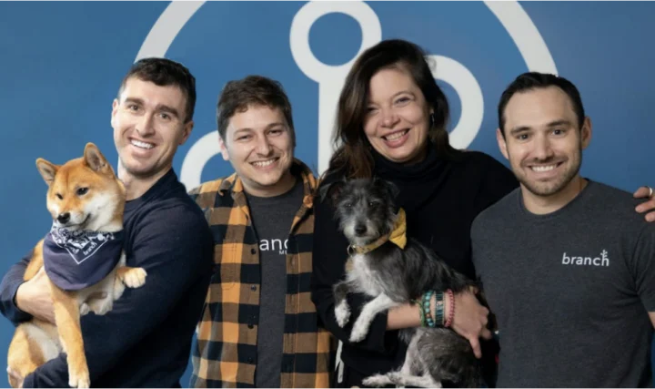 the branch team holding dogs
